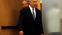 Israeli prime minister Benjamin Netanyahu enters to a media conference together with Israel's new Defence Minister Avigdor Lieberman, head of far-right Yisrael Beitenu party, following Lieberman's swearing-in ceremony at the Knesset, the Israeli parlia