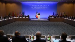 French President Francois Hollande delivers a speech during an international and interministerial conference in a bid to revive the Israeli-Palestinian peace process, in Paris