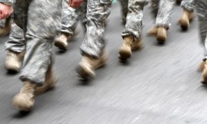U.S. army soldiers are seen marching in the St. Patrick's Day Parade in New York, March 16, 2013