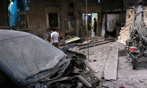 Medics inspect the damage outside a field hospital after an airstrike in the rebel-held al-Maadi neighbourhood of Aleppo, Syria,