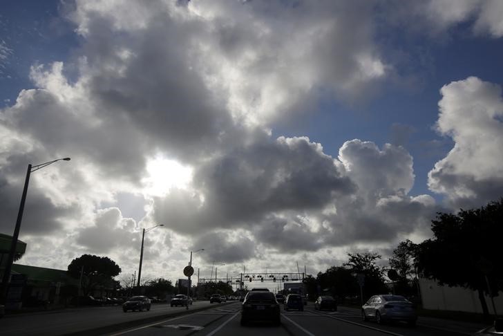 Cars are seen along Deerfield beach near Coral Springs while Hurricane Matthew approaches in Florida