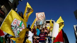 Palestinians take part in a rally in support of Palestinian President Mahmoud Abbas in the West Bank city of Ramallah