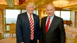 Israeli Prime Minister Benjamin Netanyahu (R) stands next to Republican U.S. presidential candidate Donald Trump during their meeting in New York, U.S.