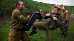 A female Israeli soldier from the Haraam artillery battalion takes part in a training session in Krav Maga, an Israeli self-defence technique, at a military base in the Israeli-occupied Golan Heights March 1, 2017. REUTERS/Nir Elias