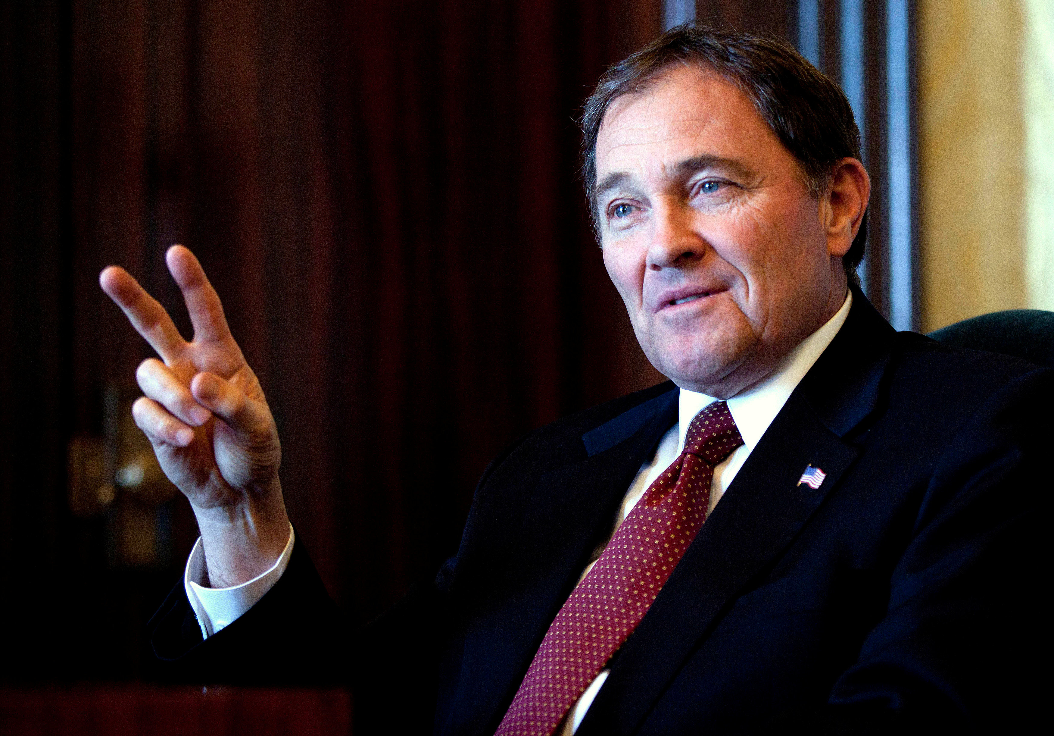 FILE PHOTO: Utah Governor Gary Herbert talks about the state's economic development in Salt Lake City, Utah January 11, 2012. REUTERS/Jim Urquhart/File Photo