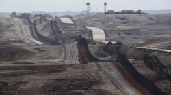 A general view shows Israel's border fence with Egypt's Sinai peninsula (R), as seen from Israel's Negev Desert