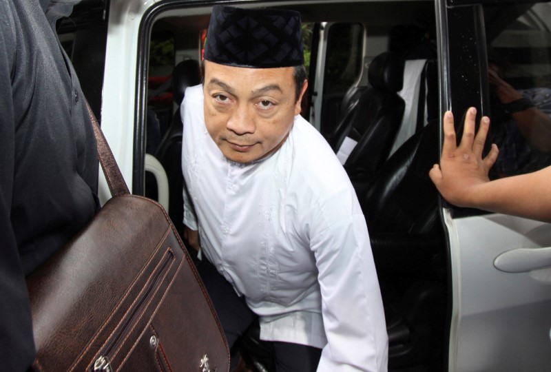 Chairman of GNPF-MUI, Bachtiar Nasir, arrives at a police station to testify as a witness in a money laundering case at a police station in Jakarta, Indonesia February 10, 2017 in this photo taken by Antara Foto. Antara Foto/Reno Esnir/via REUTERS