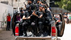 Members of Palestinian security forces loyal to Hamas ride a truck outside a Hamas-run military court where alleged collaborators with Israel are prosecuted, in Gaza City May 21, 2017. REUTERS/Mohammed Salem