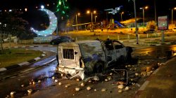 A police car, burnt during clashes which erupted in the Arab town of Kafr Qassem, is seen at the entrance to the town in central Israel, early June 6, 2017. REUTERS/Tomer Appelbaum