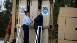 Israeli Prime Minister Benjamin Netanyahu (R) speaks with Amir Eshel, commander of the Israeli Air Force, as they stand next to a David's Sling launcher system during a ceremony in which Israel declared its "David's Sling" intermediate-range air defence shield fully operational, at Hatzor air base in southern Israel April 2, 2017. REUTERS/Amir Cohen