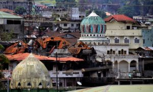 Damaged buildings and houses are seen as government forces continue their assault against insurgents from the Maute group, who have taken over large parts of the Marawi City, Philippines June 22, 2017. REUTERS/Romeo Ranoco