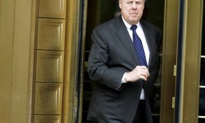 FILE PHOTO: Lawyer John Dowd exits Manhattan Federal Court in New York May 11, 2011. REUTERS/Brendan McDermid/File photo