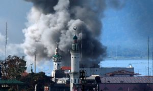 An explosion is seen after a Philippines army aircraft released a bomb during an airstrike as government troops continue their assault against insurgents from the Maute group in Marawi city June 27, 2017. REUTERS/Jorge Silva