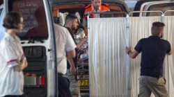 Medics evacuate an Israeli woman who was injured during a knife attack in the Jewish settlement of Neve Tsuf at the West Bank, at a hospital in Jerusalem July 21, 2017. REUTERS/Emil Salman
