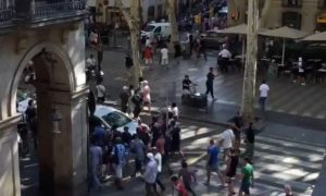 Van crashes into crowds in Barcelona, media say two killed