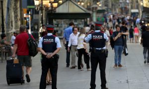 Spanish police shoot five suspects dead after van rampage kills 13 in Barcelona
