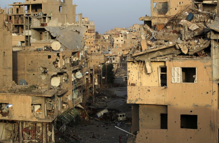 Syrian army fights to secure corridor into Deir al-Zor