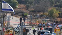 Israeli emergency and security personnel work at the scene where a police spokeswoman said a Palestinian gunman killed three Israelis guards and wounded a fourth in an attack on a Jewish settlement in the occupied West Bank before himself being shot dead, September 26, 2017. REUTERS/Ammar Awad