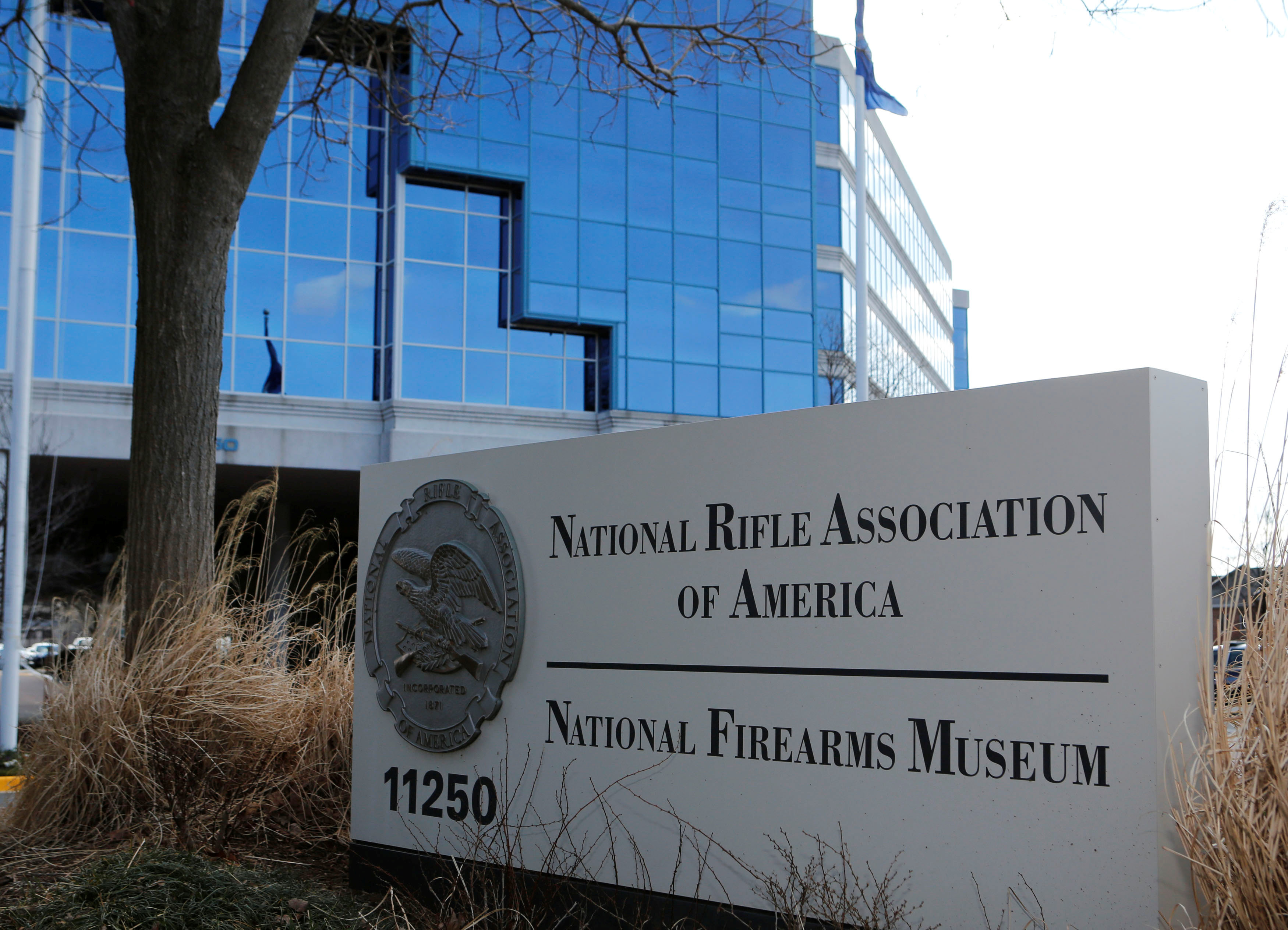 FILE PHOTO: A sign of the National Rifle Association (NRA) is seen in front of their headquarters in Fairfax, Virginia, U.S. on March 14, 2013. REUTERS/Larry Downing/File Photo
