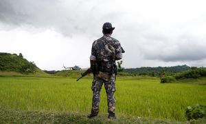 A Myanmar soldier stands near Maungdaw, north of Rakhine state, Myanmar September 27, 2017. REUTERS/Soe Zeya Tun