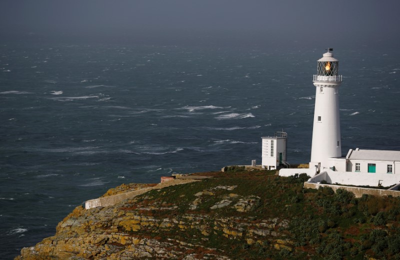 A lighthouse is seen as storm Ophelia approaches South Stack in Anglesey, Wales, Britain, October 16, 2017