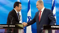 Guatemalan President Jimmy Morales and Israeli Prime Minister Benjamin Netanyahu shake hands as they deliver statements to the media during their meeting in Jerusalem November 29, 2016.