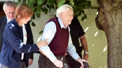Oskar Groening, defendant and former Nazi SS officer dubbed the "bookkeeper of Auschwitz" leaves the court after the announcement of his verdict in Lueneburg, Germany, July 15, 2015.