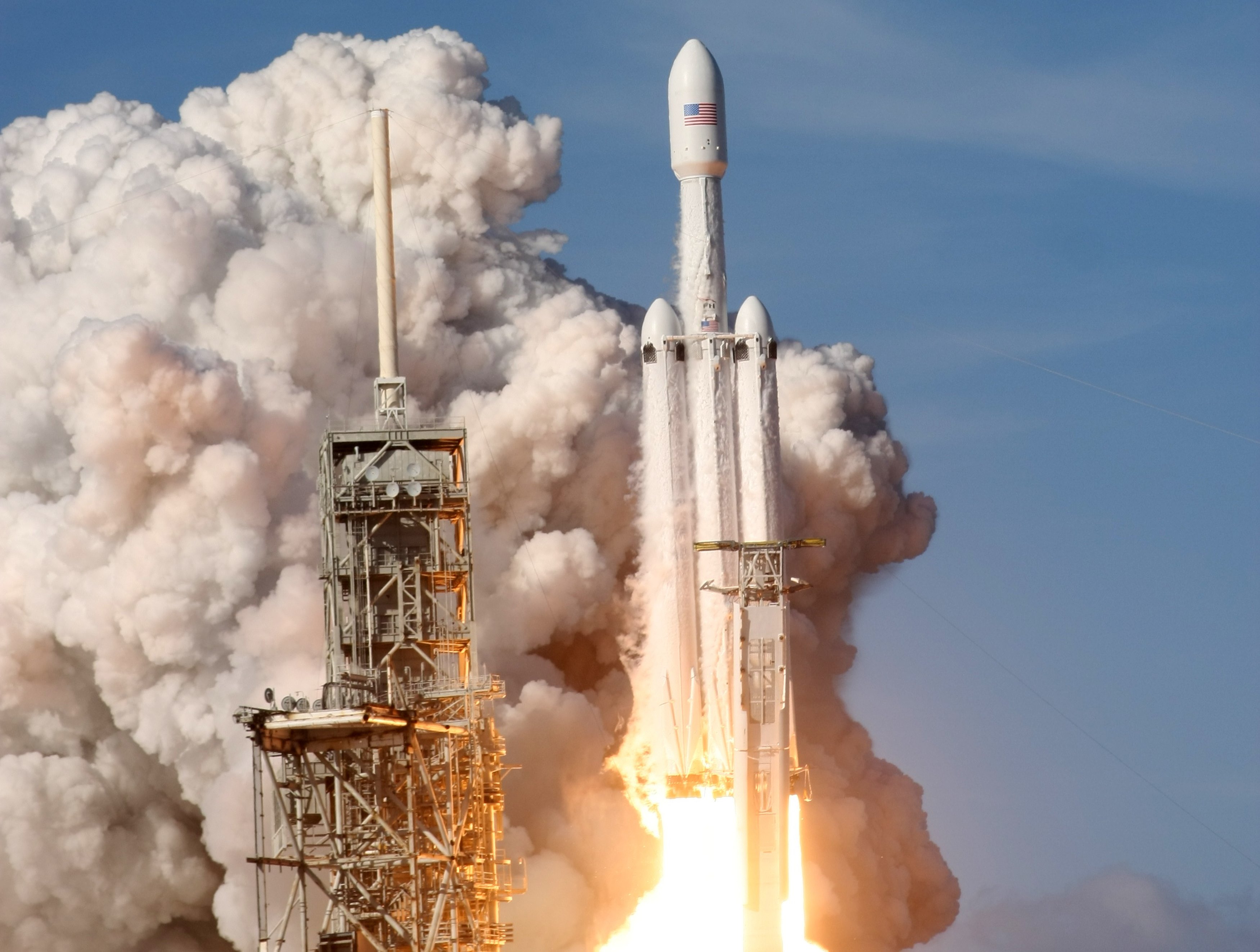 A SpaceX Falcon Heavy rocket lifts off from historic launch pad 39-A at the Kennedy Space Center in Cape Canaveral, Florida, U.S., February 6, 2018.