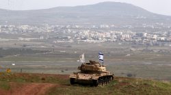 An old military vehicle can be seen positioned on the Israeli side of the border with Syria, near the Druze village of Majdal Shams in the Israeli-occupied Golan Heights, Israel February 11, 2018.