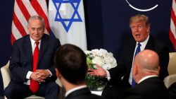 FILE PHOTO - U.S. President Donald Trump speaks with Israeli Prime Minister Benjamin Netanyahu during the World Economic Forum (WEF) annual meeting in Davos, Switzerland January 25, 2018. REUTERS/Carlos Barria