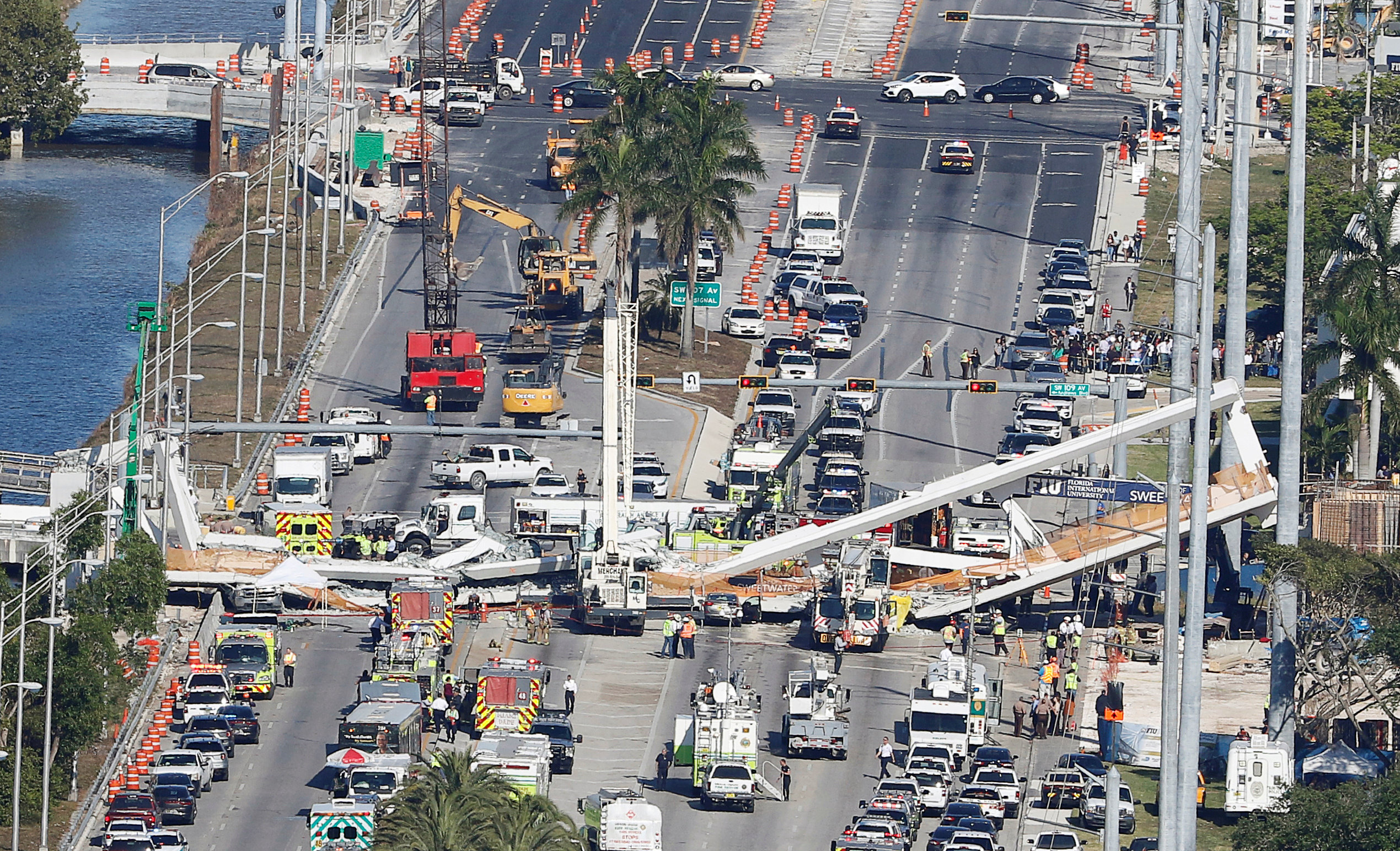 FILE PHOTO: Aerial view shows a pedestrian bridge collapsed at Florida International University in Miami, Florida, U.S., March 15, 2018. REUTERS/Joe Skipper/File Photo