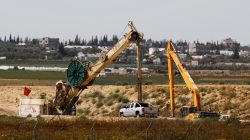 FILE PHOTO: Construction work can be seen on the Israeli side of the border between Israel and the Gaza Strip, Israel March 18, 2018. REUTERS/Amir Cohen/File Photo