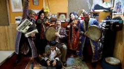 Amin Alaev (R), 55 (R), Aviva Alaev (2nd R), 22, Allo Alaev (C), 85, Amanda Alaev (2nd L), 13, Ariel Alaev (L), 51, and Avraham Alaev, 7, pose for a photograph in their rehearsal studio in Rishon Lezion, Israel March 22, 2018. REUTERS/Amir Cohen