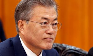 South Korea's President Moon Jae-in is seen during a meeting with Vietnam's Prime Minister Nguyen Xuan Phuc (not pictured) at the Government Office in Hanoi, Vietnam March 23, 2018. REUTERS/Kham/Pool