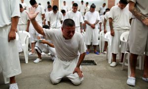 Members of the Torre Fuerte (Strong Tower) evangelical church participate in a religious service at the San Francisco Gotera prison, in San Francisco Gotera, El Salvador, March 9, 2018. Former members of the Barrio 18 gang abandoned their gang and decided to form two churches in order to leave their violent past. REUTERS/Jose Cabezas