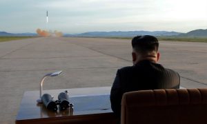 North Korean leader Kim Jong Un watches the launch of a Hwasong-12 missile in this undated photo released by North Korea's Korean Central News Agency (KCNA) on September 16, 2017. KCNA via REUTERS