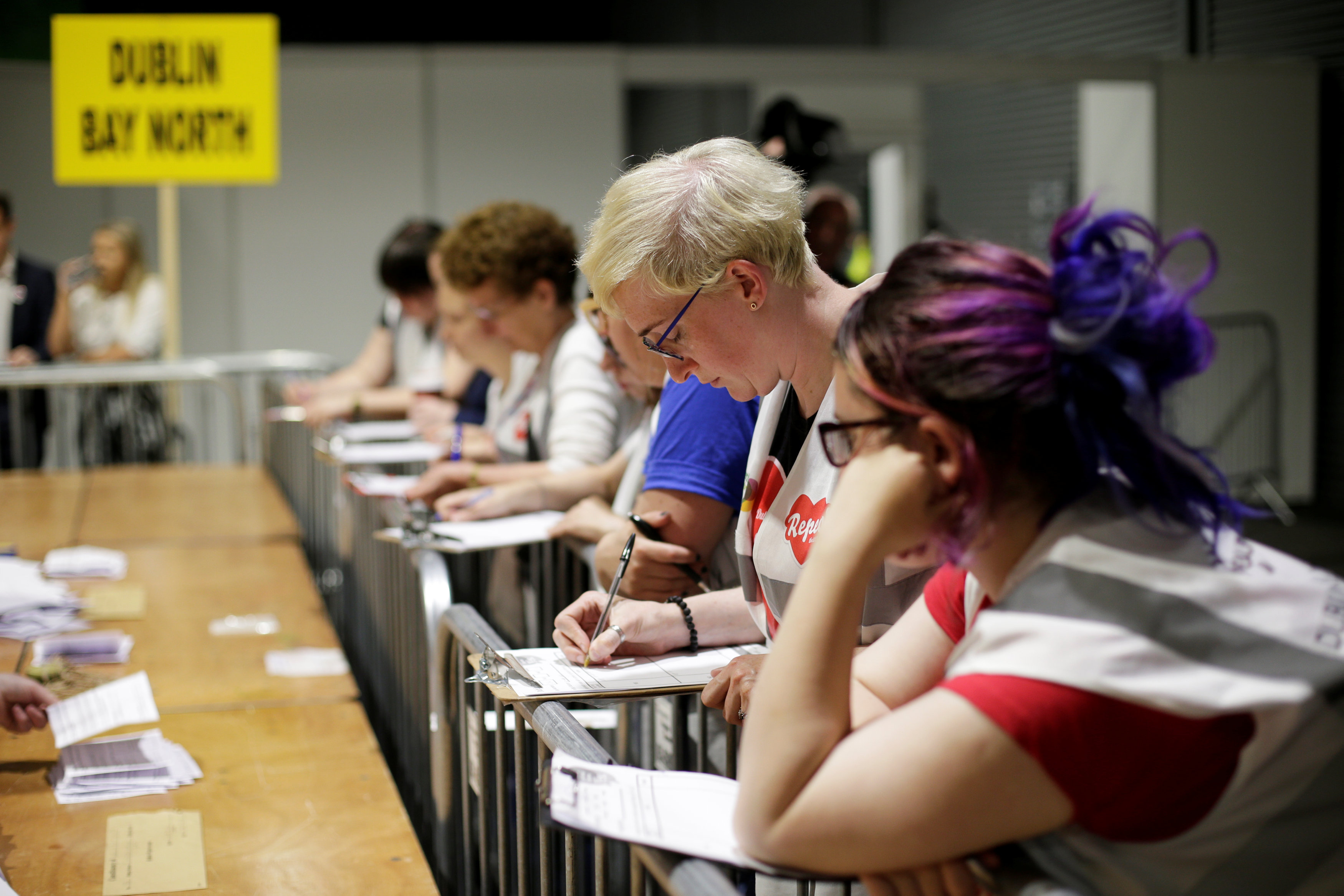 Observers watch as votes are tallied folowing yesterday's referendum on liberalizing abortion law, in Dublin, Ireland, May 26, 2018. REUTERS/Max Rossi