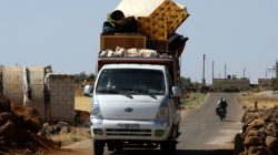 People ride in a truck loaded with belongings in Deraa countryside, Syria June 22, 2018. REUTERS/Alaa al-Faqir