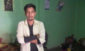 Satish Bhaykre, 21, who was beaten by a mob due to a fake WhatsApp text, poses inside his house on the outskirts of Nagpur, India, June 23, 2018. Picture taken June 23, 2018. REUTERS/Stringer