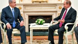 Russian President Vladimir Putin speaks with Israeli Prime Minister Benjamin Netanyahu during their meeting at the Kremlin in Moscow, Russia July 11, 2018. Yuri Kadobnov/Pool via REUTERS