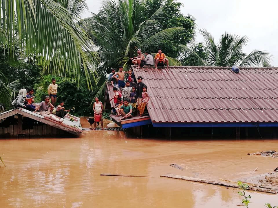 Villagers evacuate after the Xepian-Xe Nam Noy hydropower dam collapsed in Attapeu province, Laos July 24, 2018. ABC Laos News/Handout via REUTERS