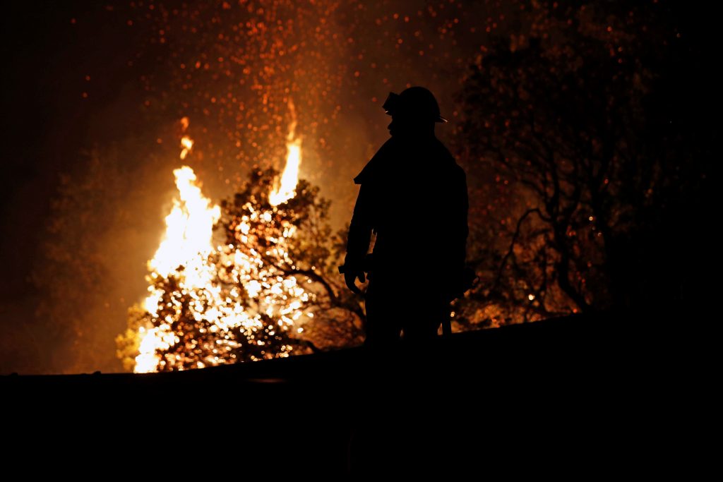 California 'Tasmanian devil' fire kills 2 firefighters, thousands flee