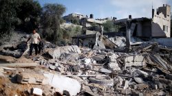 A Palestinian man inspects a Hamas site that was hit in an Israeli air strike, in Al-Mughraqa on the outskirts of Gaza City August 9, 2018. REUTERS/Mohammed Salem