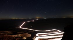 Cars drive through Ramon Crater during the Perseid meteor shower near the town of Mitzpe Ramon, southern Israel, August 12, 2018. REUTERS/Amir Cohen