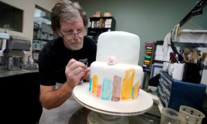 FILE PHOTO: Baker Jack Phillips decorates a cake in his Masterpiece Cakeshop in Lakewood, Colorado U.S. on September 21, 2017. REUTERS/Rick Wilking/File Photo
