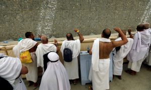Muslim pilgrims cast stones at a pillar that symbolizes Satan, during the annual haj pilgrimage in Mena, Saudi Arabia August 21, 2018. REUTERS/Zohra Bensemra
