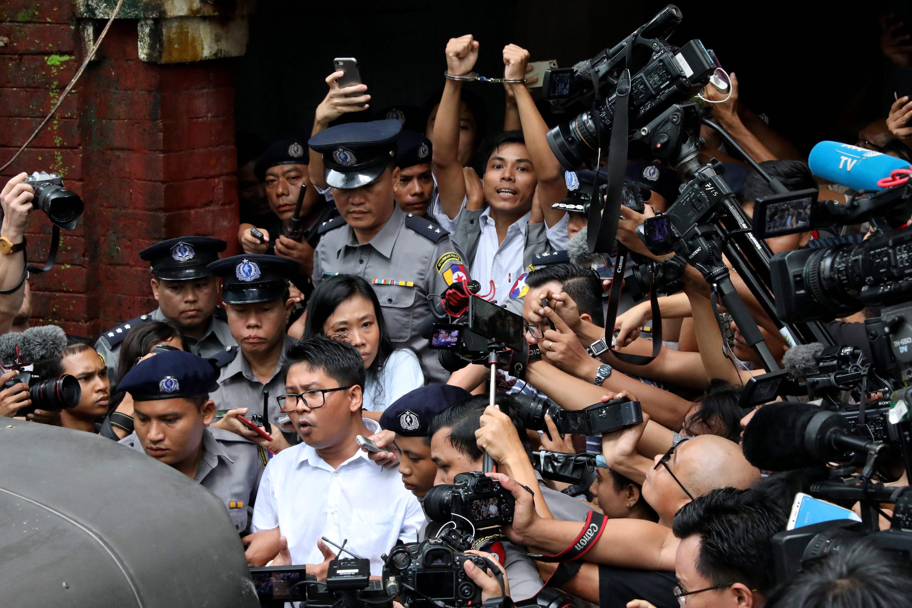 Detained Reuters journalists Wa Lone and Kyaw Soe Oo leave Insein court after listening to the verdict in Yangon, Myanmar September 3, 2018. REUTERS/Stringer