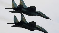 FILE PHOTO: Russian-made Sukhoi fighter jets of the Iranian army fly past during a military parade to commemorate army day in Tehran April 17, 2008. REUTERS/Morteza Nikoubazl/File Photo
