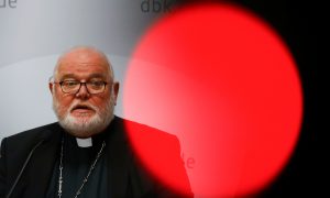 Cardinal Reinhard Marx, chairman of German Bishops's Conference attends a press conference to present the findings of a study into the report of sexual abuse by Catholic priests of thousands of children over a 70-year period in Fulda, Germany, September 25, 2018. REUTERS/Kai Pfaffenbach