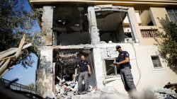 Israeli sappers work on a house that the Israeli military said was hit by a rocket fired from the Gaza Strip, in Beersheba, southern Israel October 17, 2018. REUTERS/Amir Cohen